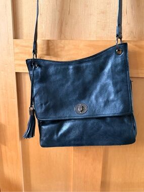 Classic Black Leather Crossbody Bag with Tassel Accent